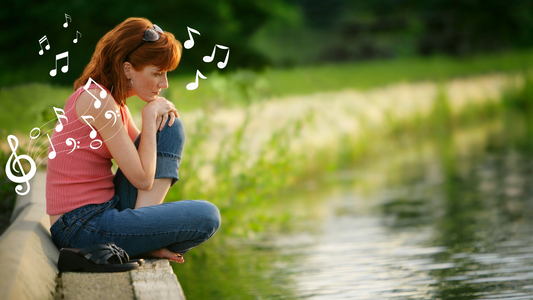 Image of a person sitting with a contemplative expression, surrounded by musical notes floating around their head.