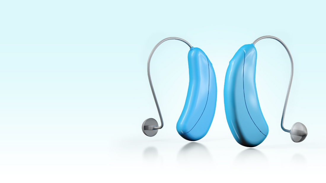 An image showing two hearing aids placed on a white surface, symbolizing the use of two hearing aids