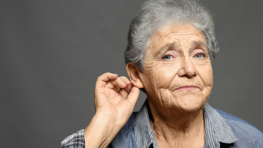 An illustration showing an elderly person holding their ear, symbolizing age-related hearing loss.