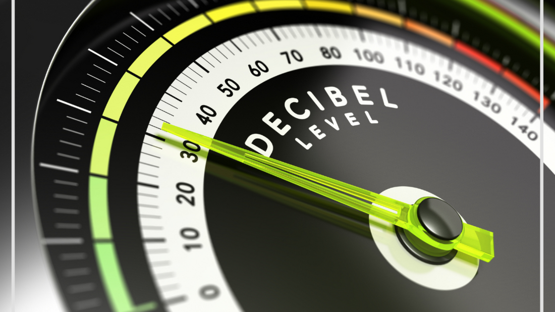 Illustration of a volume gauge with decibel levels ranging from quiet to loud environments.