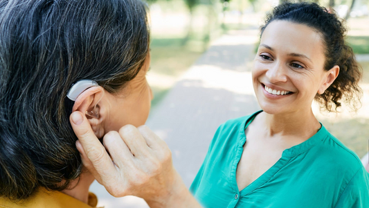 Person wearing a discreet hearing aid, highlighting that affordable solutions can integrate seamlessly into daily life.